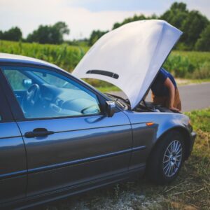 Broken down car with hood up