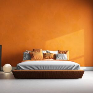Bedroom with bright orange colors 