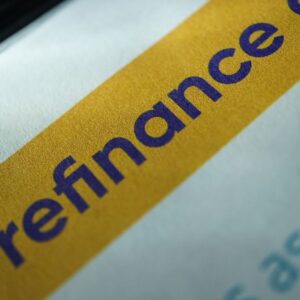 The word "refinance" with a yellow and white background