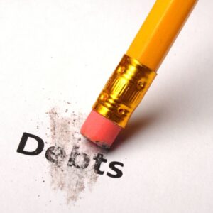 The word "debt" being erased by the tip of an eraser on a pencil