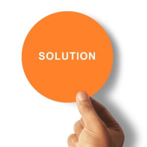 Hand holding up orange circle that reads: "solution"