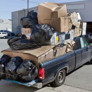 Truck filled with junk in truck bed