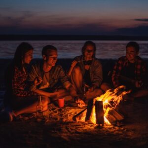 People sitting by the fire