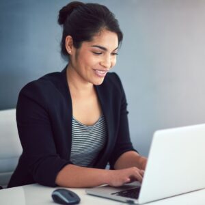 Woman typing on computer