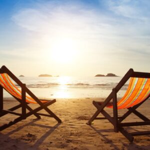 Two beach chairs on the beach